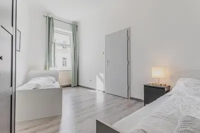 Ein Bett oder Betten in einem Zimmer der Unterkunft Cozy 2-Bedroom Apartment Near Prater & Danube