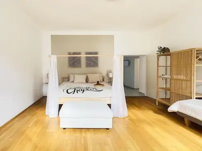 Ein Bett oder Betten in einem Zimmer der Unterkunft Servus Homes - Metro Stadthalle - Kaiser Franz Josef