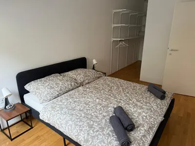 Ein Bett oder Betten in einem Zimmer der Unterkunft QuietApt Vienna