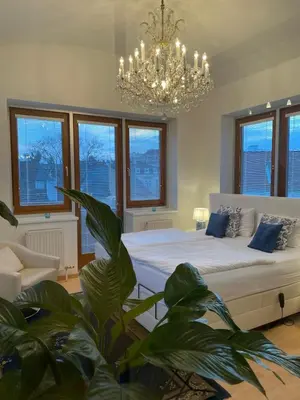 Ein Bett oder Betten in einem Zimmer der Unterkunft Amadeus Studio