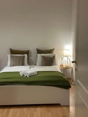 Ein Bett oder Betten in einem Zimmer der Unterkunft Viennese Nest Apartment