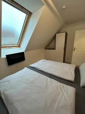Ein Bett oder Betten in einem Zimmer der Unterkunft Bright apartment with terrace near Schönbrunn