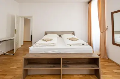 Ein Bett oder Betten in einem Zimmer der Unterkunft Ruby Apartment Vienna