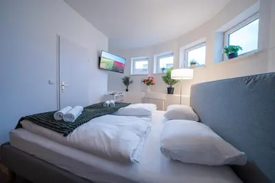 Ein Bett oder Betten in einem Zimmer der Unterkunft Rooftop Studios, 10min to city center, tram and metro, no Elevator 4th Floor