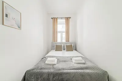 Ein Bett oder Betten in einem Zimmer der Unterkunft Central Apartment near Westbahnhof