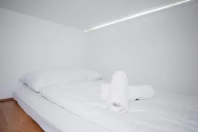 Ein Bett oder Betten in einem Zimmer der Unterkunft Design Micro-Studio - 10 minutes to Central Station