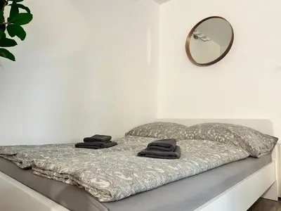 Ein Bett oder Betten in einem Zimmer der Unterkunft Sunny Cosy Apartment near Schönbrunn