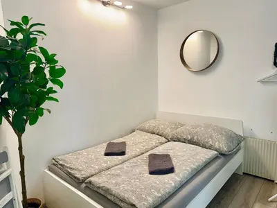 Ein Bett oder Betten in einem Zimmer der Unterkunft Sunny Cosy Apartment near Schönbrunn