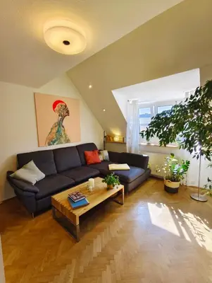 Ein Sitzbereich in der Unterkunft Dachgeschosswohnung mit Dachterrasse