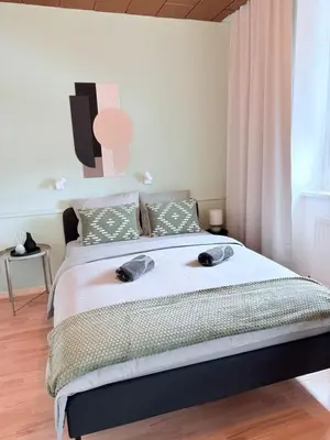 Ein Bett oder Betten in einem Zimmer der Unterkunft Modernes Doppelzimmer in Wien Donaustadt - MALA