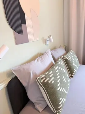 Ein Bett oder Betten in einem Zimmer der Unterkunft Modernes Doppelzimmer in Wien Donaustadt - MALA