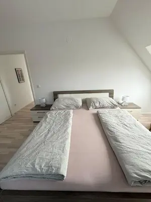 Ein Bett oder Betten in einem Zimmer der Unterkunft Leo Stay