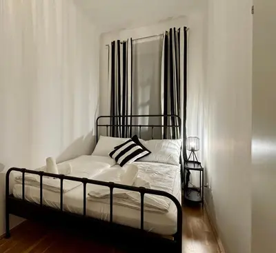 Ein Bett oder Betten in einem Zimmer der Unterkunft Elegantes CityApartment Vienna mit Wohlfühlfaktor