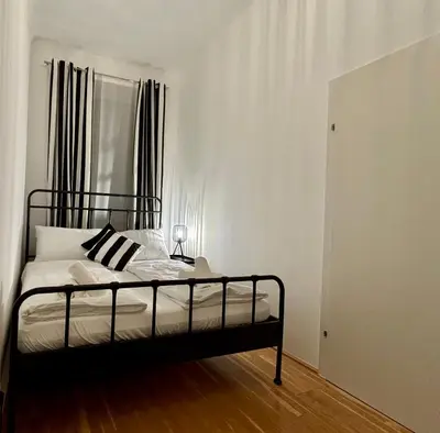 Ein Bett oder Betten in einem Zimmer der Unterkunft Elegantes CityApartment Vienna mit Wohlfühlfaktor