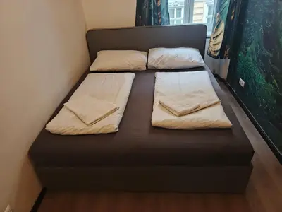 Ein Bett oder Betten in einem Zimmer der Unterkunft Apartments in Vienna near Schönbrunn & Westbahnhof - Keyless Check-In
