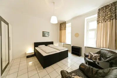Ein Bett oder Betten in einem Zimmer der Unterkunft Apartments in Vienna near Schönbrunn & Westbahnhof - Keyless Check-In