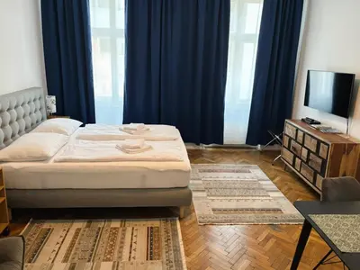 Ein Bett oder Betten in einem Zimmer der Unterkunft Casa Nostra - Schöne 3-Zimmerwohnung am Augarten