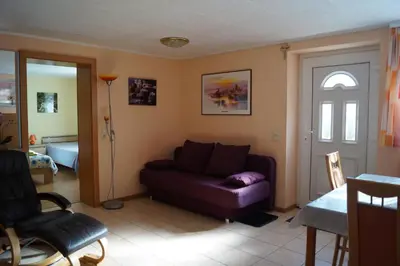 Ein Sitzbereich in der Unterkunft Apartment Robert