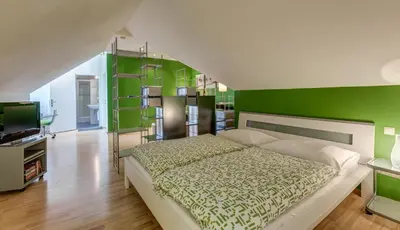 Ein Bett oder Betten in einem Zimmer der Unterkunft Gästehaus Wutschitz