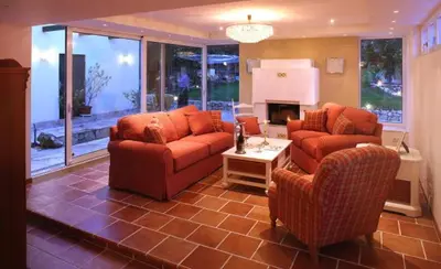 Ein Sitzbereich in der Unterkunft Romantic Cottage