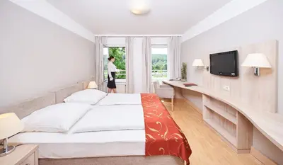 Ein Bett oder Betten in einem Zimmer der Unterkunft Europahaus Wien