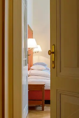 Ein Bett oder Betten in einem Zimmer der Unterkunft Hotel Herzoghof