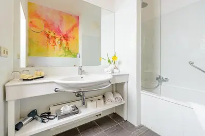 Ein Badezimmer in der Unterkunft Hotel Herzoghof