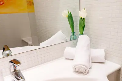 Ein Bett oder Betten in einem Zimmer der Unterkunft Hotel Herzoghof