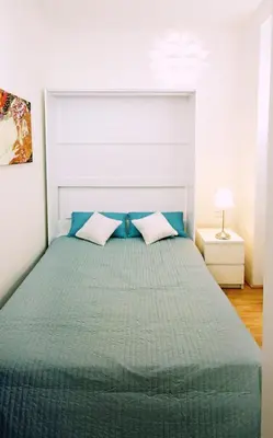 Ein Bett oder Betten in einem Zimmer der Unterkunft Herzlich Willkommen - Küss die Hand