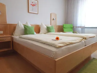 Ein Bett oder Betten in einem Zimmer der Unterkunft Haus Margarethe