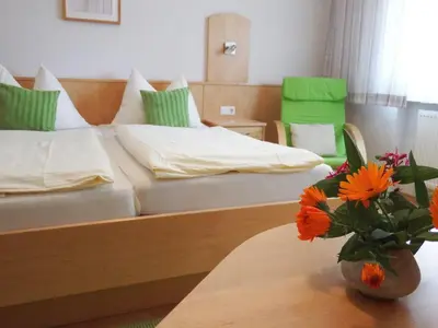 Ein Bett oder Betten in einem Zimmer der Unterkunft Haus Margarethe