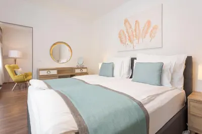 Ein Bett oder Betten in einem Zimmer der Unterkunft Mar Suite Apartments - Simmering