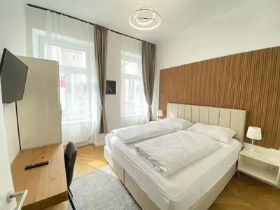 Ein Bett oder Betten in einem Zimmer der Unterkunft Vienna Stay Apartments or Rooms 1050