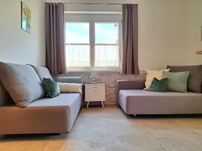 Ein Sitzbereich in der Unterkunft Appartements Regina