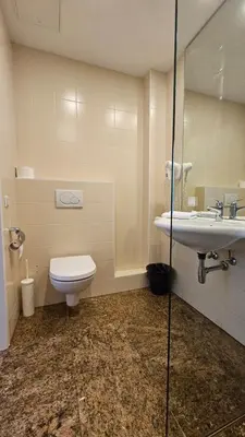 Ein Badezimmer in der Unterkunft bookVienna 