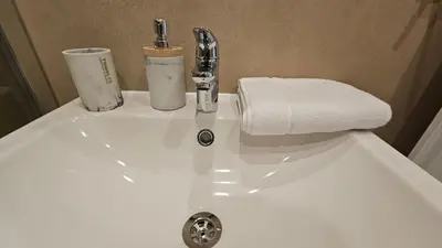 Ein Badezimmer in der Unterkunft bookVienna 