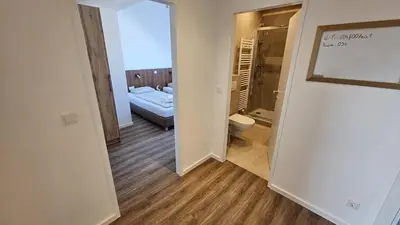 Ein Bett oder Betten in einem Zimmer der Unterkunft bookVienna 