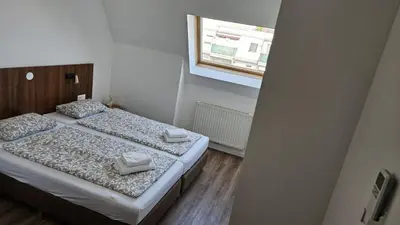 Ein Bett oder Betten in einem Zimmer der Unterkunft bookVienna 