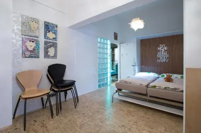 Ein Bett oder Betten in einem Zimmer der Unterkunft Apartment LAER Hundertwasserhaus