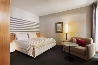 Ein Bett oder Betten in einem Zimmer der Unterkunft Holiday Inn Vienna City by IHG
