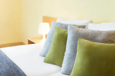 Ein Bett oder Betten in einem Zimmer der Unterkunft Landhaus Pannonia