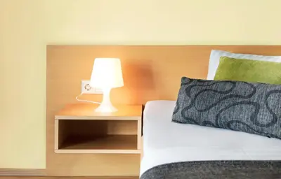Ein Bett oder Betten in einem Zimmer der Unterkunft Landhaus Pannonia