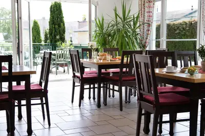 Ein Restaurant oder anderes Speiselokal in der Unterkunft Landhaus Pannonia