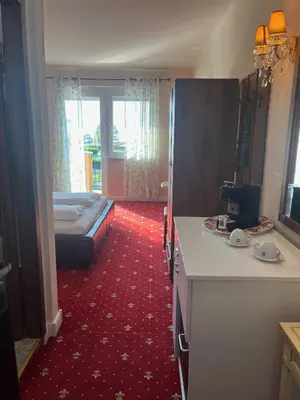 Ein Bett oder Betten in einem Zimmer der Unterkunft Hotel Al Faro Lodge am See