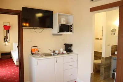 TV/Unterhaltungsangebot in der Unterkunft Hotel Al Faro Lodge am See