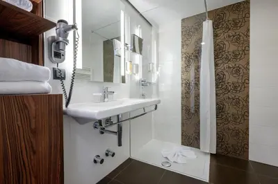 Ein Badezimmer in der Unterkunft Hotel IMLAUER Wien