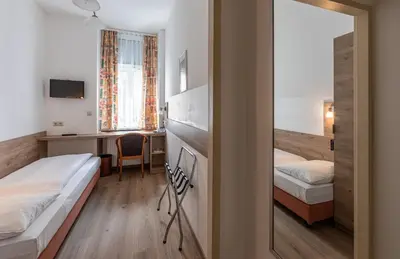 Ein Bett oder Betten in einem Zimmer der Unterkunft Hotel Terminus