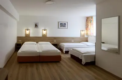 Ein Bett oder Betten in einem Zimmer der Unterkunft Hotel Terminus