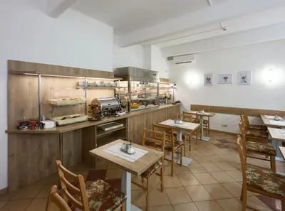 Ein Restaurant oder anderes Speiselokal in der Unterkunft Hotel Terminus