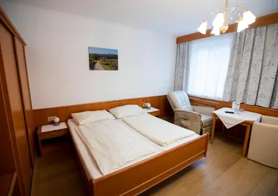 Ein Bett oder Betten in einem Zimmer der Unterkunft Gasthof & Hotel Martinek